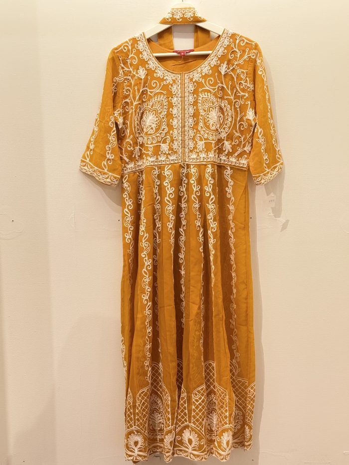 Indian yellow dress with white embroidery