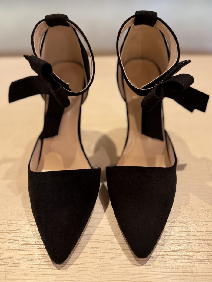 elegant black velvet pointed-toe flats with delicate ankle ties