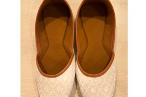 cozy beige knitted loafers with a plush interior lining for added comfort